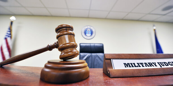 gavel with miltary judge sign