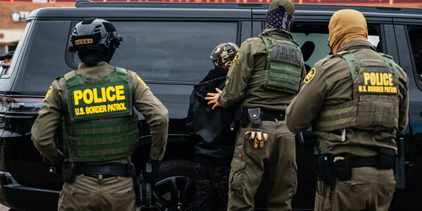 Border Patrol agents conduct an arrest in Chicago.