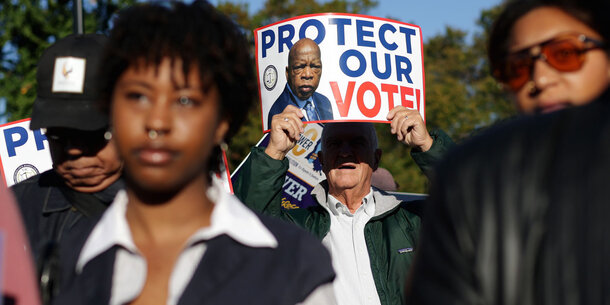 People marching in support of voting rights