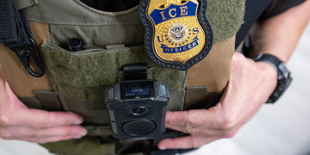 Torso of uniformed ICE agent 