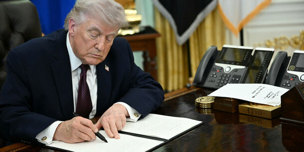 President Trump signs an executive order on mail voting. 