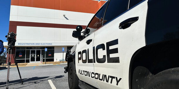 Fulton County police cruiser outside elections office