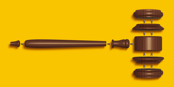 Illustration of a gavel in multiple pieces