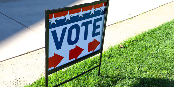 Vote sign pointing to polling place
