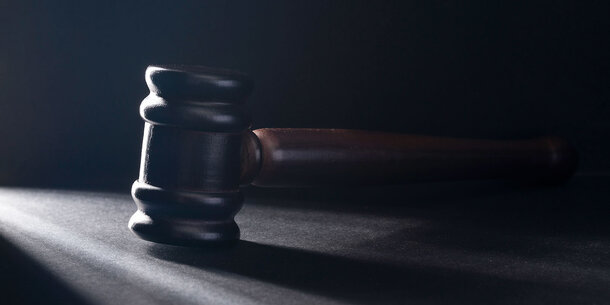 Gavel in a dark room