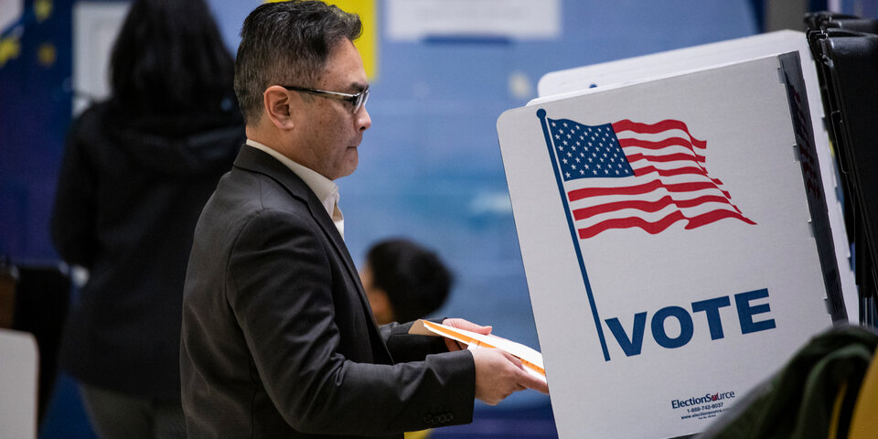 Person casting a ballot