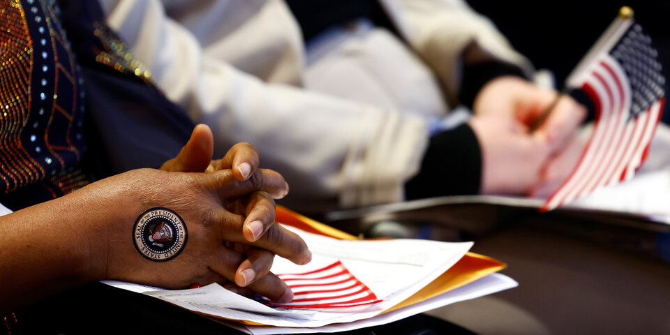 Woman's hands with hand painted with U.S. seal