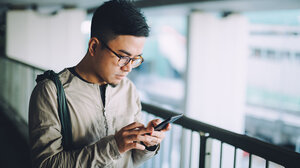 man reading cellphone