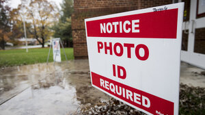 Photo ID sign
