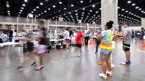Voters wait to vote at the Kentucky Exposition Center.