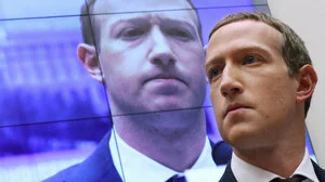 zuckerberg staring in the distance and pouting