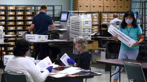 Ballots being counted