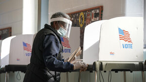 Voter in a voting booth