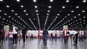 Voters at polling stations