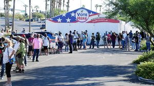 People waiting in line to vote