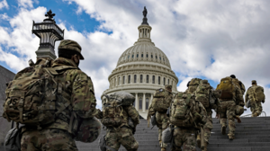 Troops go up the stairs to the U.S. Capitol