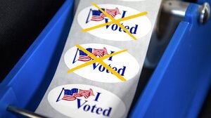 Three "I Voted" stickers are shown, with two crossed out