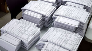 Stacks of paper ballots