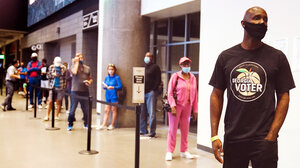 Citizens waiting in line to vote
