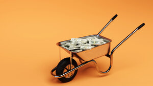 A wheelbarrow full of cash