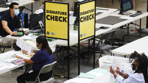 Poll workers at a polling place