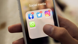 Phone screen showing social media apps
