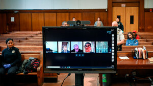 People using Skype to attend a remote court proceeding