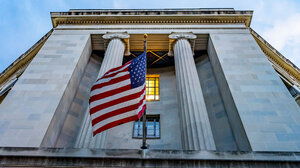 Justice Department and U.S. flag