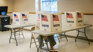 A voter in Mississippi casting a ballot.