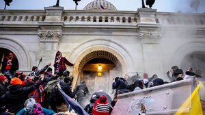 People storming the United States capitol building