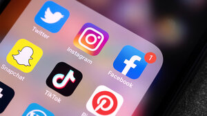 iPhone screen displaying social media apps