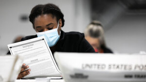 Woman Reviewing Ballot
