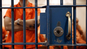 Man behind bars
