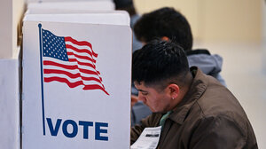 Person at a voting booth