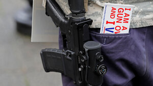 Person openly carrying a gun