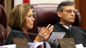 Justice Barbara Pariente on bench in profile