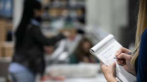 Person working at a polling place