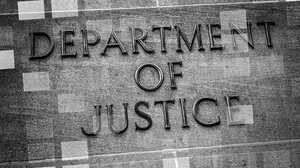 Department of Justice gray sign