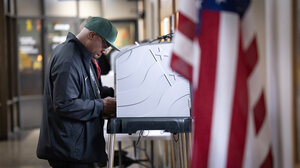 Person at a voting booth