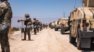 National Guard troops assisting a DEA drug raid in California