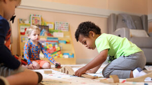 Children playing inside a daycare.