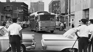 Police waiting for Freedom Riders on a bus.