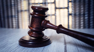 Gavel in front of window