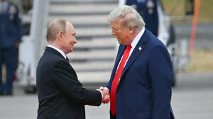 Trump and Putin shaking hands 