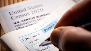 Person filling out census form