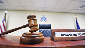 gavel with miltary judge sign