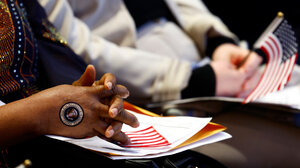 Woman's hands with hand painted with U.S. seal