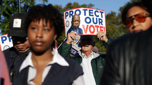 People marching in support of voting rights