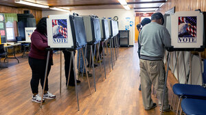 People voting in a polling location
