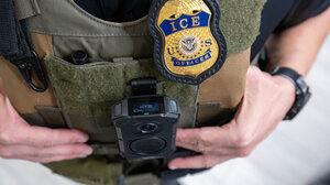 Torso of uniformed ICE agent 